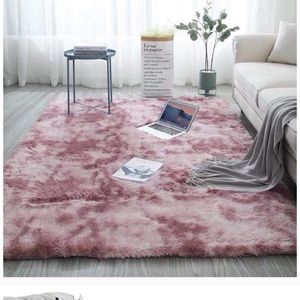 Two brand new rugs